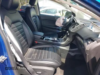 2020 Ford Edge SEL z VIN 2FMPK4J98LBA07595, wystawiony jako IAAI lot #42068572 z przebiegiem 105 352 mil mil oraz . Historia ofert i sprzedaży dostępna na DreamBid. Obrazek 5.