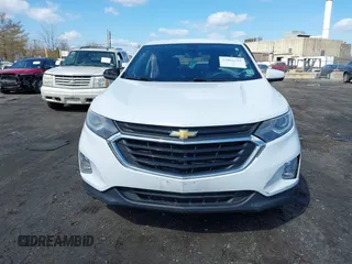 2020 Chevrolet Equinox LT z VIN 2GNAXKEV8L6141918, wystawiony jako IAAI lot #41882535 z przebiegiem 125 974 mil mil oraz . Historia ofert i sprzedaży dostępna na DreamBid. Obrazek 13.