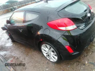 2012 Hyundai Veloster w/Gray Int with VIN KMHTC6AD2CU024382, listed as a IAAI auction lot 41980192 with 46,684 mi miles and . Bid and sale history available at DreamBid. Image 3.