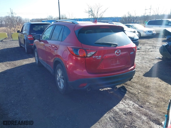 2016 Mazda CX-5 Touring with VIN JM3KE4CY0G0901356, listed as a IAAI auction lot 41641742 with 96,950 mi miles. Bid and sale history available at carsss.com. Image 3.