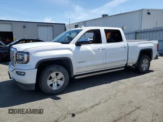 2018 GMC Sierra 1500 Denali z VIN 3GTU2PEJ7JG215264, wystawiony jako Copart lot #52815735 z przebiegiem 145 427 mil mil oraz Szkoda całkowita • Salvage title. Historia ofert i sprzedaży dostępna na DreamBid. Obrazek 1.