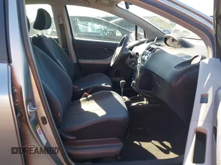 2010 Toyota Yaris with VIN JTDKT4K38A5285260, listed as a IAAI auction lot 41476373 with 104,358 mi miles. Bid and sale history available at carsss.com. Image 5.