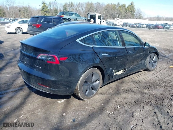 2018 Tesla Model 3 Long Range Battery with VIN 5YJ3E1EB5JF127358, listed as a IAAI auction lot 41759788 with 85,277 mi miles. Bid and sale history available at carsss.com. Image 4.