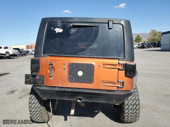 2011 Jeep Wrangler Unlimited Sahara with VIN 1J4BA5H19BL588797, listed as a Copart auction lot 72681904 with 100,763 mi miles and Salvage Title. Bid and sale history available at carsss.com. Image 6.