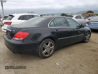 2006 Acura RL z VIN JH4KB16506C011226, wystawiony jako Copart lot #53918385 z przebiegiem 200 433 mil mil oraz Szkoda całkowita • Salvage title. Historia ofert i sprzedaży dostępna na DreamBid. Obrazek 3.
