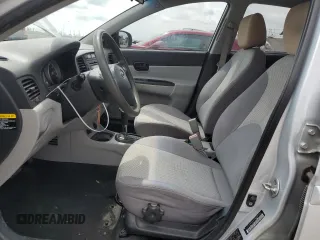 2010 Hyundai Accent GLS z VIN KMHCN4ACXAU473196, wystawiony jako Copart lot #55462405 z przebiegiem 198 235 mil mil oraz Szkoda całkowita • Salvage title. Historia ofert i sprzedaży dostępna na DreamBid. Obrazek 7.
