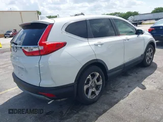 2019 Honda CR-V EX with VIN 5J6RW1H51KA007719, listed as a IAAI auction lot 41985574 with 58,696 mi miles. Bid and sale history available at carsss.com. Image 4.