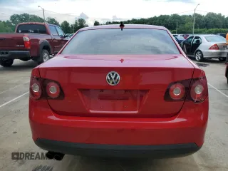 2010 Volkswagen Jetta Wolfsburg Edition with VIN 3VWRJ7AJXAM154666, listed as a Copart auction lot 60556875 with 149,509 mi miles and Salvage title. Bid and sale history available at DreamBid. Image 6.