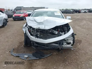 2014 Chevrolet Impala LT with VIN 2G1125S38E9102607, listed as a IAAI auction lot 41860235 with 128,599 mi miles and . Bid and sale history available at DreamBid. Image 13.
