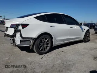 2022 Tesla Model 3 with VIN 5YJ3E1EA3NF125895, listed as a Copart auction lot 50042005 with 47,181 mi miles and Salvage Title. Bid and sale history available at DreamBid. Image 3.