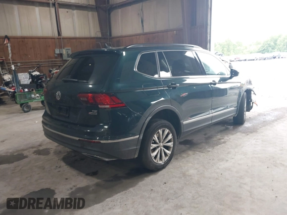 2018 Volkswagen Tiguan SEL with VIN 3VV2B7AX3JM133326, listed as a IAAI auction lot 42459190 with 94,665 mi miles and . Bid and sale history available at DreamBid. Image 4.