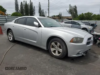 2012 Dodge Charger SE with VIN 2C3CDXBG4CH203207, listed as a Copart auction lot 56910395 with 156,016 mi miles and Salvage Title. Bid and sale history available at DreamBid. Image 4.