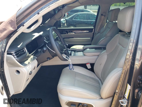 2022 Jeep Wagoneer Series III with VIN 1C4SJVDT8NS201275, listed as a Copart auction lot 63481615 with 57,569 mi miles and Salvage title. Bid and sale history available at DreamBid. Image 7.