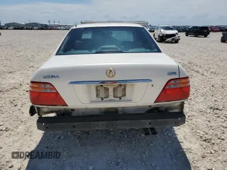 1999 Acura RL with VIN JH4KA9664XC004727, listed as a Copart auction lot 62120054 with 0 mi miles and Salvage Title. Bid and sale history available at carsss.com. Image 6.