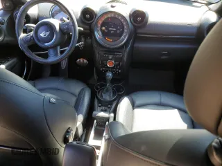 2016 MINI Countryman S with VIN WMWZC5C56GWP49473, listed as a Copart auction lot 50752355 with 118,060 mi miles and Salvage Title. Bid and sale history available at DreamBid. Image 8.