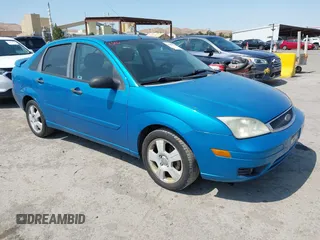 2007 Ford Focus S z VIN 1FAHP34N77W333895, wystawiony jako IAAI lot #42444411 z przebiegiem 155 522 mil mil oraz . Historia ofert i sprzedaży dostępna na DreamBid. Obrazek 1.