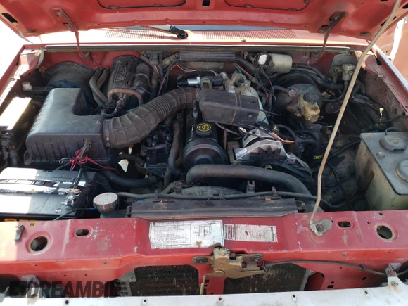 1989 Ford Ranger Splash with VIN 1FTCR10A2KUB58322, listed as a Copart auction lot 77710394 with 890,534 mi miles and Salvage Title. Bid and sale history available at DreamBid. Image 13.