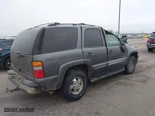 2002 Chevrolet Tahoe LT with VIN 1GNEK13Z42J219242, listed as a IAAI auction lot 41208846 with 279,366 mi miles. Bid and sale history available at carsss.com. Image 4.