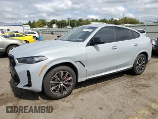 2025 BMW X6 M60i with VIN 5UX43EX06S9W68023, listed as a Copart auction lot 69874764 with 3,789 mi miles and Salvage Title. Bid and sale history available at carsss.com. Image 1.