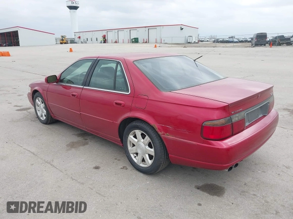 2001 Cadillac Seville z VIN 1G8KS54Y91U227846, wystawiony jako IAAI lot #42134095 z przebiegiem 216 766 mil mil oraz . Historia ofert i sprzedaży dostępna na DreamBid. Obrazek 3.