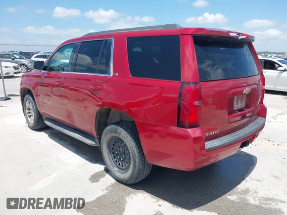 2015 Chevrolet Tahoe LS with VIN 1GNSCAEC4FR121571, listed as a IAAI auction lot 42499156 with 131,284 mi miles and . Bid and sale history available at DreamBid. Image 3.