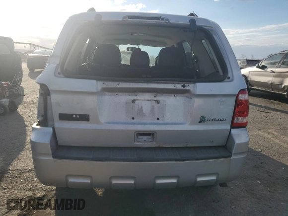 2012 Ford Escape Hybrid с VIN 1FMCU5K37CKA30865, выставлен на аукционе Copart как лот 79235264 с пробегом 140 112 миль миль и Списание • Salvage title. История ставок и продаж доступна на DreamBid. Изображение 6.