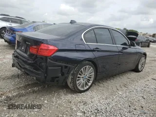 2012 BMW 3 Series 328i with VIN WBA3A5G51CNP17682, listed as a Copart auction lot 59619485 with 100,936 mi miles and Salvage title. Bid and sale history available at DreamBid. Image 3.
