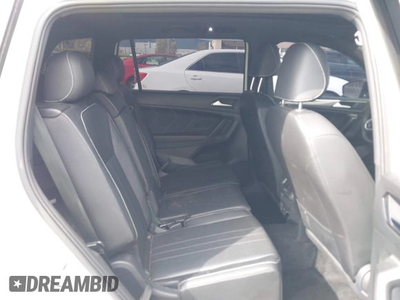 2023 Volkswagen Tiguan SE R-Line Black with VIN 3VVCB7AX3PM133002, listed as a IAAI auction lot 41902721 with 32,915 mi miles and . Bid and sale history available at DreamBid. Image 8.