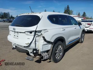 2019 Hyundai Santa Fe SE with VIN 5NMS2CAD0KH098259, listed as a IAAI auction lot 42075356 with 55,163 mi miles and . Bid and sale history available at DreamBid. Image 4.