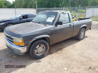1992 Dodge Dakota z VIN 1B7FL26X0NS508319, wystawiony jako IAAI lot #42468014 z przebiegiem 195 683 mil mil oraz . Historia ofert i sprzedaży dostępna na DreamBid. Obrazek 2.