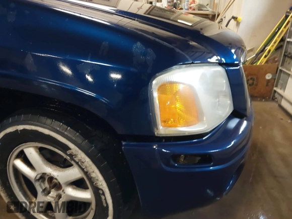 2004 GMC Envoy XL SLE with VIN 1GKET16S746189409, listed as a IAAI auction lot 41255883 with 177,785 mi miles. Bid and sale history available at carsss.com. Image 12.