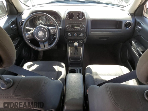 2015 Jeep Patriot Latitude with VIN 1C4NJPFB3FD377959, listed as a Copart auction lot 57914755 with 106,704 mi miles and Salvage title. Bid and sale history available at DreamBid. Image 8.
