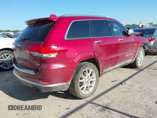 2015 Jeep Grand Cherokee Summit with VIN 1C4RJEJG9FC100568, listed as a IAAI auction lot 42512705 with 128,413 mi miles and . Bid and sale history available at DreamBid. Image 4.