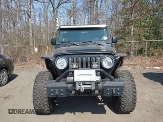 2004 Jeep Wrangler Rubicon with VIN 1J4FA69S64P789308, listed as a IAAI auction lot 41714489 with 186,302 mi miles. Bid and sale history available at carsss.com. Image 12.