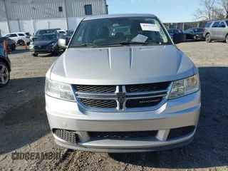 2013 Dodge Journey American Value with VIN 3C4PDCAB3DT610374, listed as a IAAI auction lot 40899147 with 133,386 mi miles and . Bid and sale history available at DreamBid. Image 6.