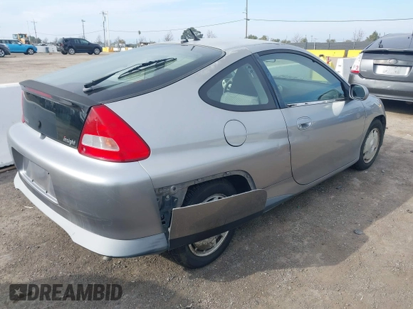 2001 Honda Insight z VIN JHMZE14741T003228, wystawiony jako IAAI lot #41432511 z przebiegiem 227 809 mil mil oraz . Historia ofert i sprzedaży dostępna na DreamBid. Obrazek 4.