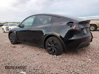 2025 Tesla Model Y Long Range z VIN 7SAYGDED9SF313959, wystawiony jako Copart lot #52823755 z przebiegiem 1 137 mil mil oraz Szkoda całkowita • Salvage title. Historia ofert i sprzedaży dostępna na DreamBid. Obrazek 2.