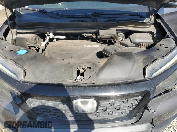 2019 Honda Passport EX-L with VIN 5FNYF7H58KB003906, listed as a Copart auction lot 46312795 with 59,417 mi miles and Salvage Title. Bid and sale history available at carsss.com. Image 12.