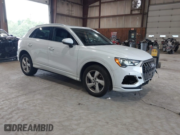 2020 Audi Q3 Premium with VIN WA1AECF3XL1090825, listed as a IAAI auction lot 42541577 with 32,432 mi miles and . Bid and sale history available at DreamBid. Image 1.