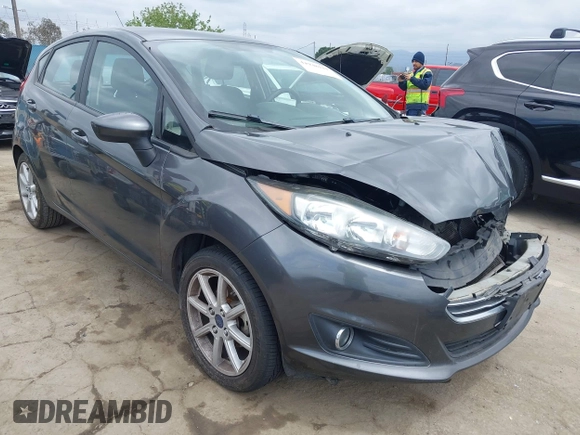 2018 Ford Fiesta SE with VIN 3FADP4EJ7JM127256, listed as a IAAI auction lot 41938121 with 83,211 mi miles. Bid and sale history available at carsss.com. Image 1.