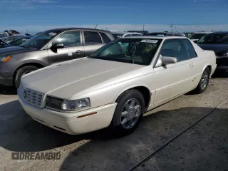 2001 Cadillac Eldorado Touring ETC z VIN 1G6ET12941B101128, wystawiony jako Copart lot #73832624 z przebiegiem Nie podano mil oraz Nie do naprawy. Historia ofert i sprzedaży dostępna na DreamBid. Obrazek 1.