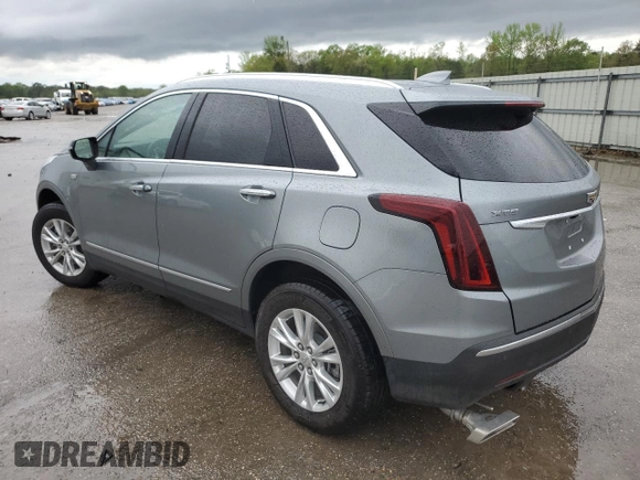 2023 Cadillac XT5 FWD Luxury z VIN 1GYKNAR47PZ144988, wystawiony jako Copart lot #50830365 z przebiegiem 17 687 mil mil oraz Szkoda całkowita • Salvage title. Historia ofert i sprzedaży dostępna na DreamBid. Obrazek 2.