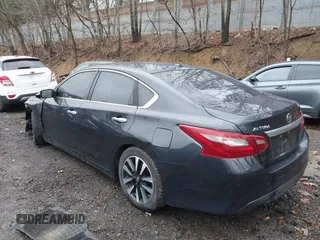 2018 Nissan Altima SV with VIN 1N4AL3AP3JC205875, listed as a IAAI auction lot 41892855 with 159,630 mi miles and . Bid and sale history available at DreamBid. Image 3.