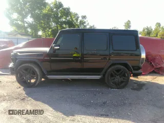 2005 Mercedes-Benz G-Class with VIN WDCYR49E25X156547, listed as a IAAI auction lot 38640157 with 241,209 mi miles. Bid and sale history available at carsss.com. Image 14.