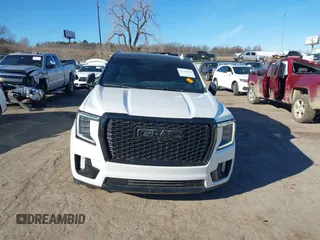 2021 GMC Yukon XL Denali with VIN 1GKS2JKT1MR401207, listed as a IAAI auction lot 41242619 with 87,902 mi miles and . Bid and sale history available at carsss.com. Image 12.