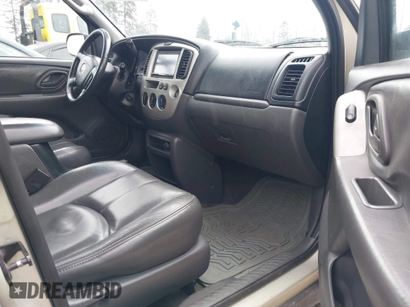 2003 Mazda Tribute ES with VIN 4F2CZ96193KM10389, listed as a IAAI auction lot 41938872 with 179,722 mi miles and . Bid and sale history available at DreamBid. Image 5.
