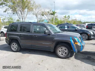2015 Jeep Patriot Sport with VIN 1C4NJPBB5FD348985, listed as a IAAI auction lot 41035027 with 146,903 mi miles. Bid and sale history available at carsss.com. Image 13.