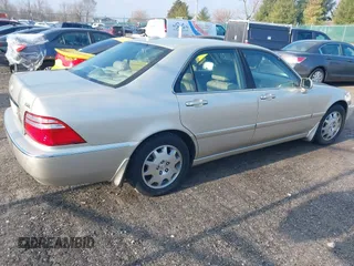 2004 Acura RL w/Navigation System z VIN JH4KA96664C001291, wystawiony jako IAAI lot #41678449 z przebiegiem 83 954 mil mil oraz . Historia ofert i sprzedaży dostępna na DreamBid. Obrazek 4.