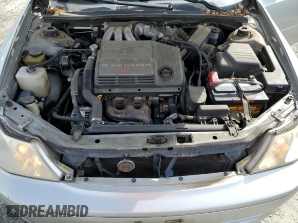 2000 Toyota Avalon XL with VIN 4T1BF28B3YU002835, listed as a Copart auction lot 50902115 with 128,699 mi miles and Salvage Title. Bid and sale history available at DreamBid. Image 11.