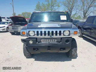 2005 Hummer H2 SUV with VIN 5GRGN23U25H128791, listed as a IAAI auction lot 42115436 with 286,818 mi miles. Bid and sale history available at carsss.com. Image 12.